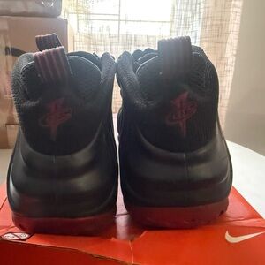 Nike Men’s Foamposite Black and Red Low-Top Basketball Shoes